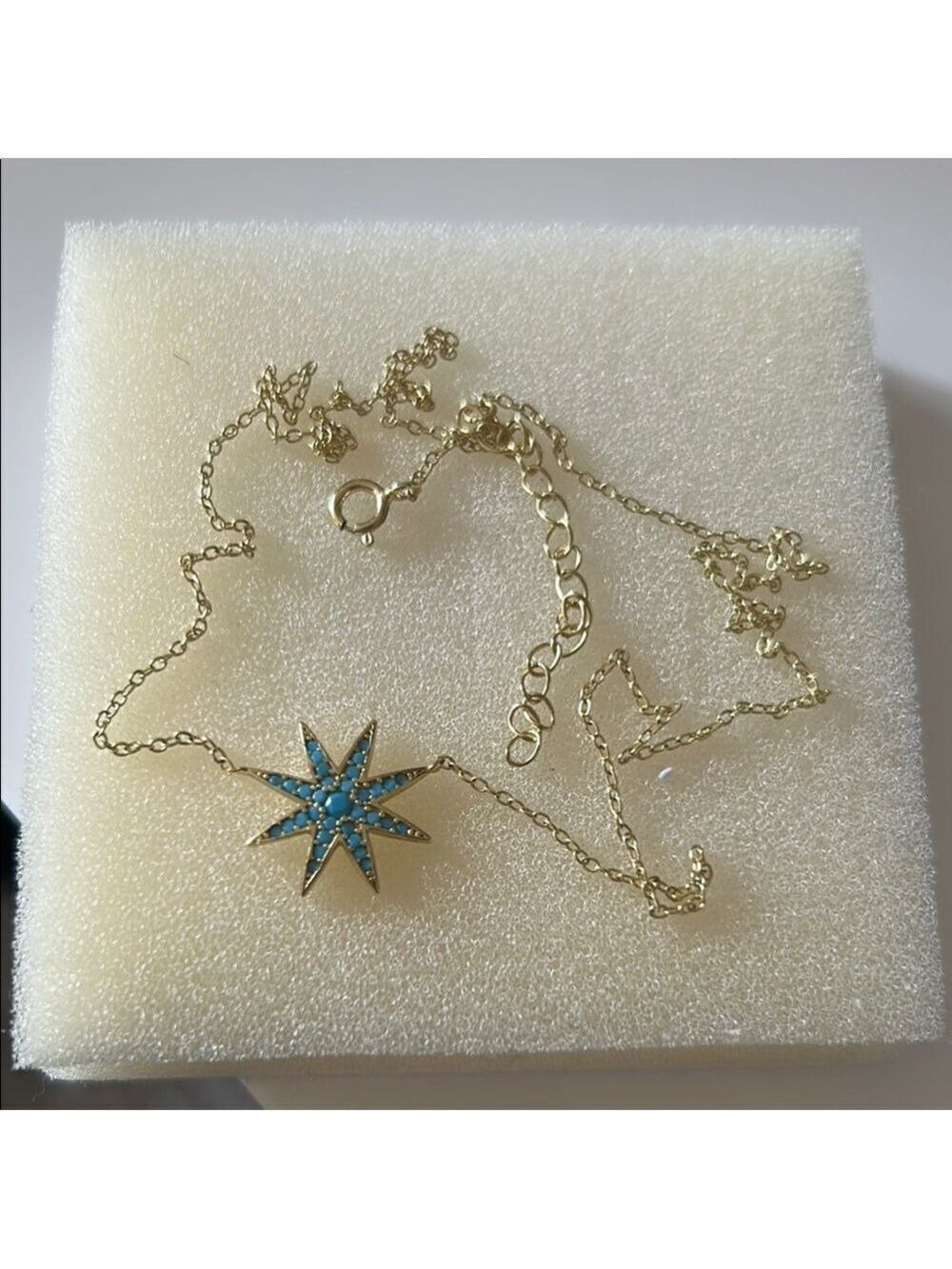 Gold coloured  Starburst Necklace with Turquoise colour Accents